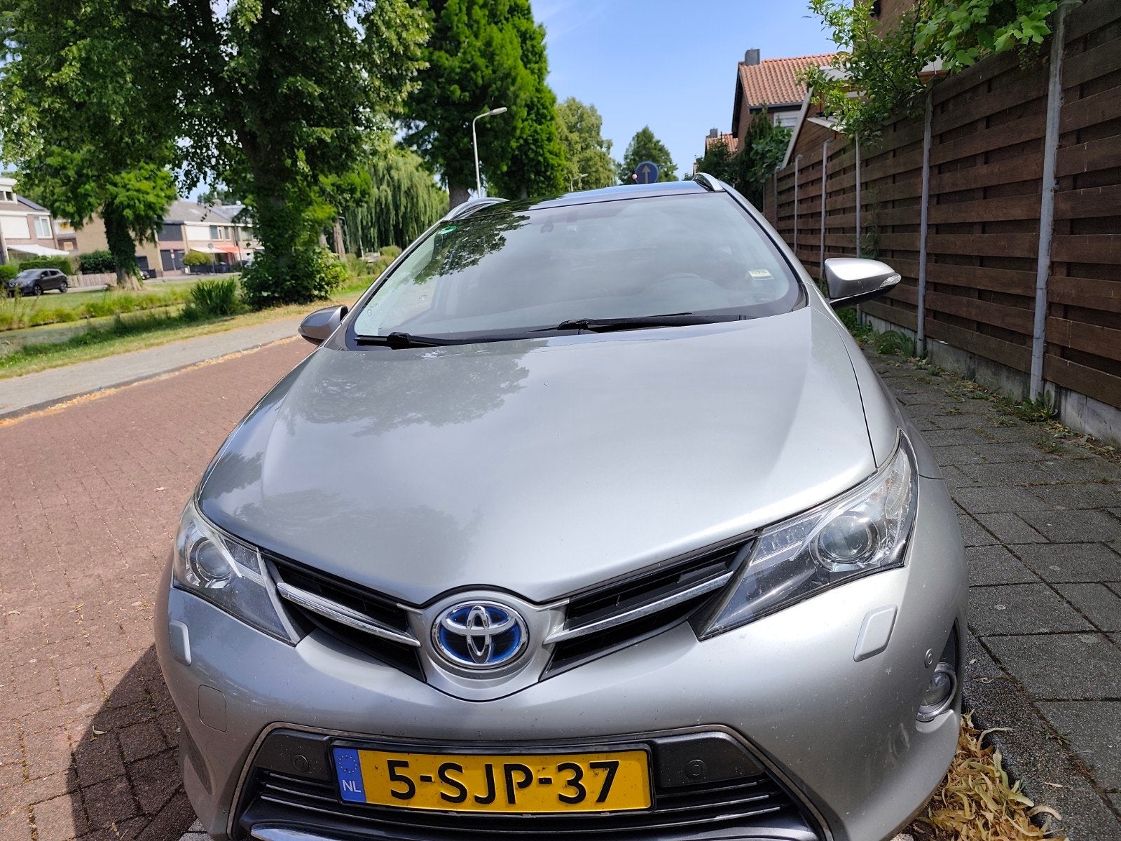 Toyota Auris 1.8 Hybrid Touring Sports CVT 2013 Grijs, 345 kg, Origineel Nederlands, 25 km/l, Te koop
