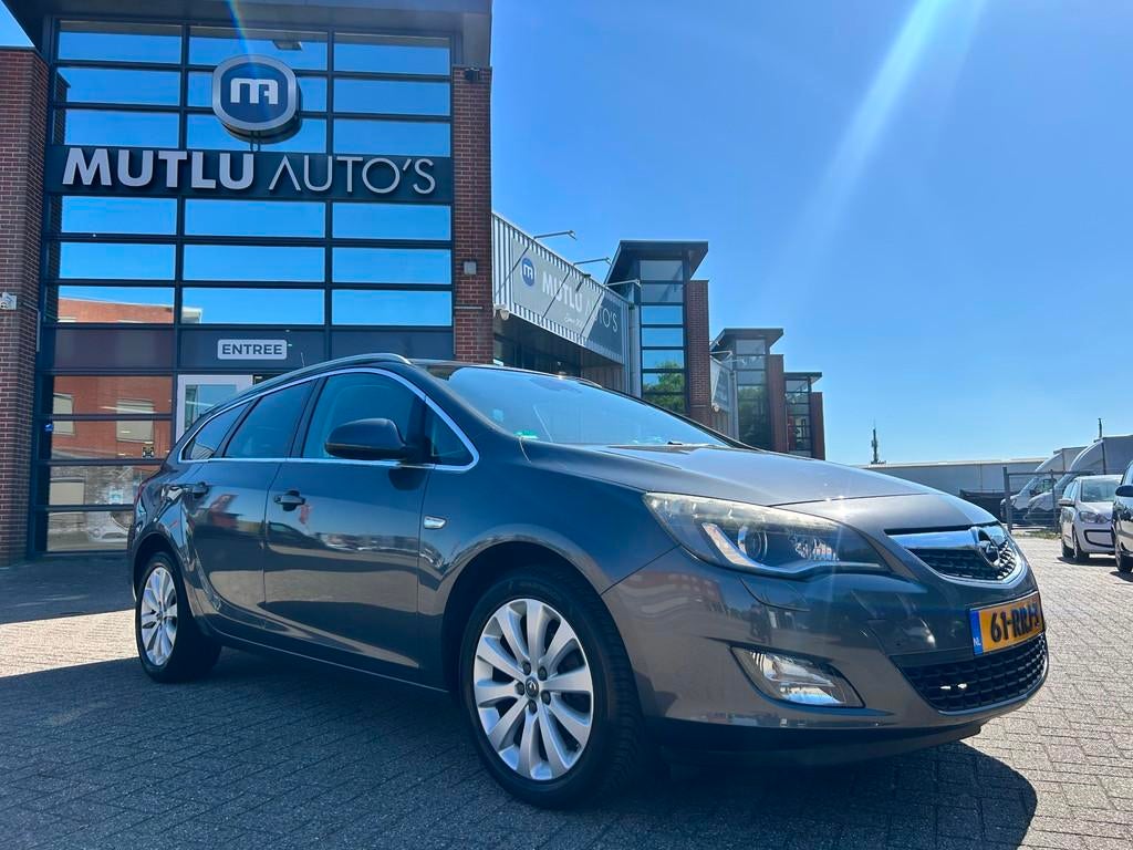 Opel Astra Sports Tourer 1.4 Turbo Cosmo NAP LEDER Airco XEN, Voorwielaandrijving, Euro 5, Gebruikt, 4 cilinders