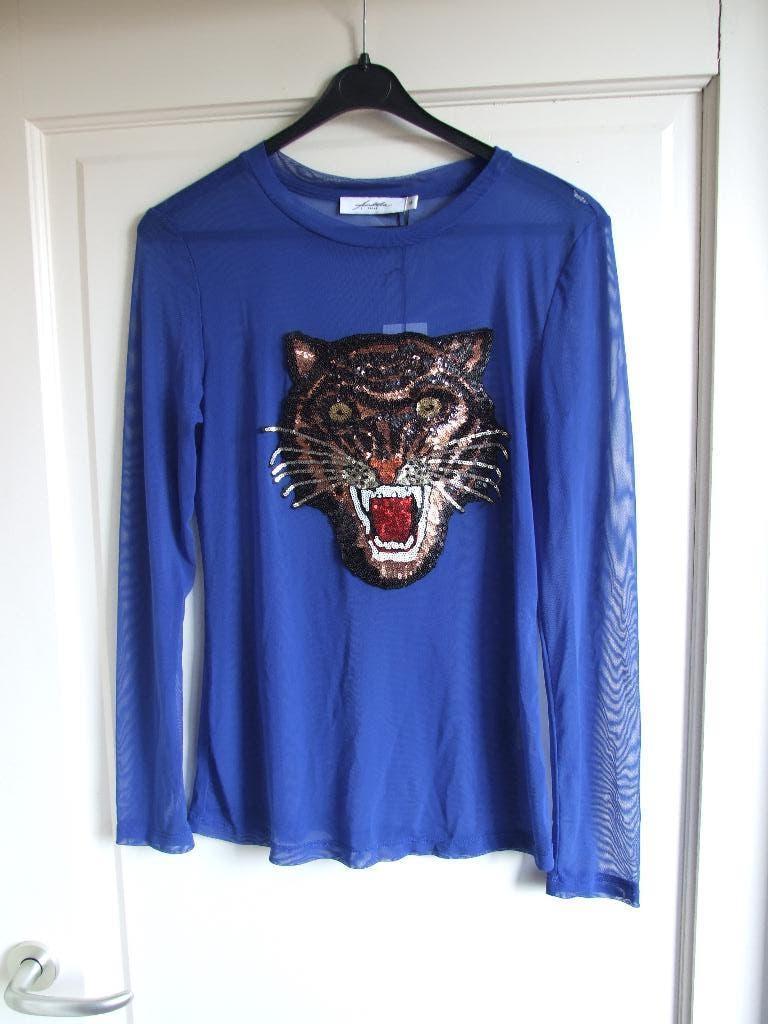 Ambika blauwe doorzichtige top met tijgerkop applicatie M, Kleding | Dames, Tops, Maat 38/40 (M), Blauw, Nieuw, Ophalen of Verzenden