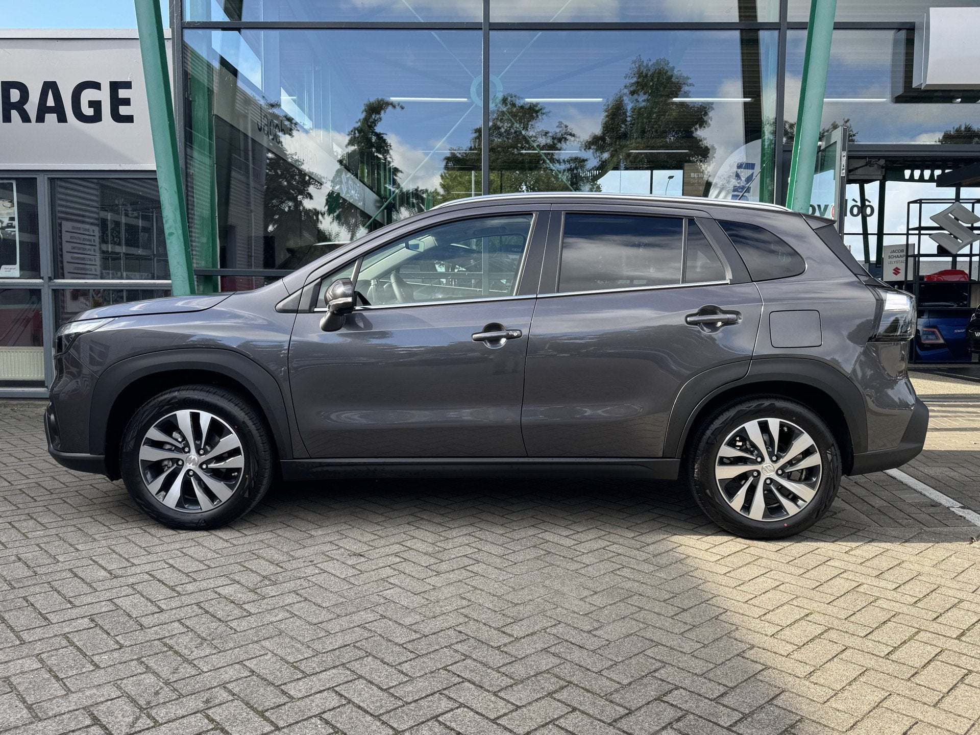 Suzuki S-Cross 1.4 Boosterjet Style Smart Hybrid 111pk | Pan, Auto's, Gebruikt, Zwart, 4 cilinders, Leder en Stof