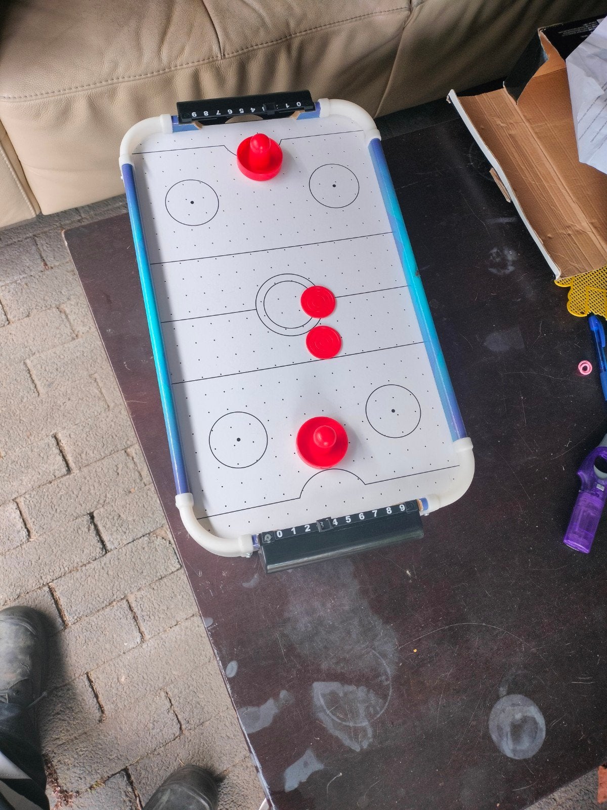 air hockey, Ophalen