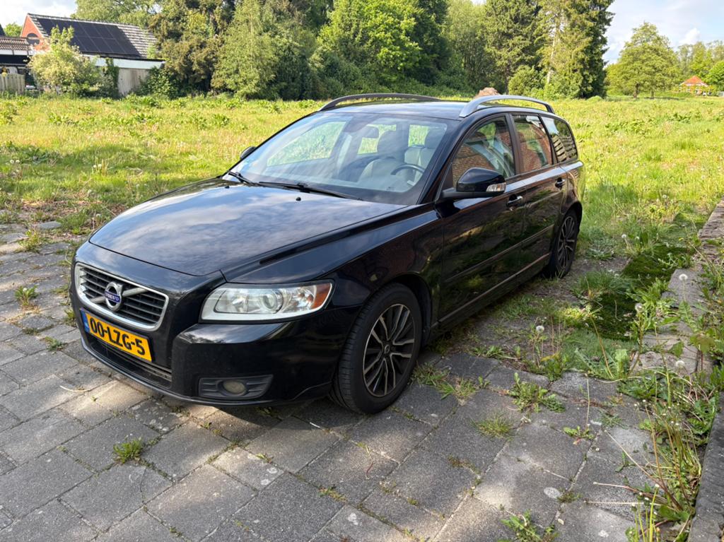 Volvo V50 1.6 D2 2010 Zwart, Auto's, Voorwielaandrijving, Euro 5, 1280 kg, Beige