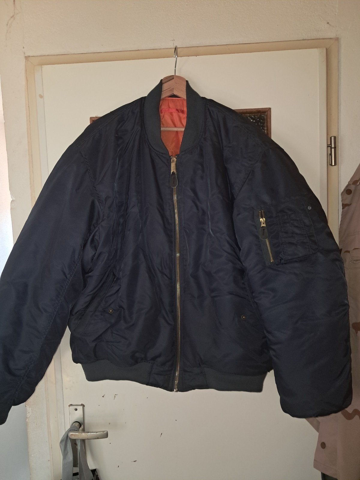 blauwe bomberjack met oranje voering, Ophalen of Verzenden