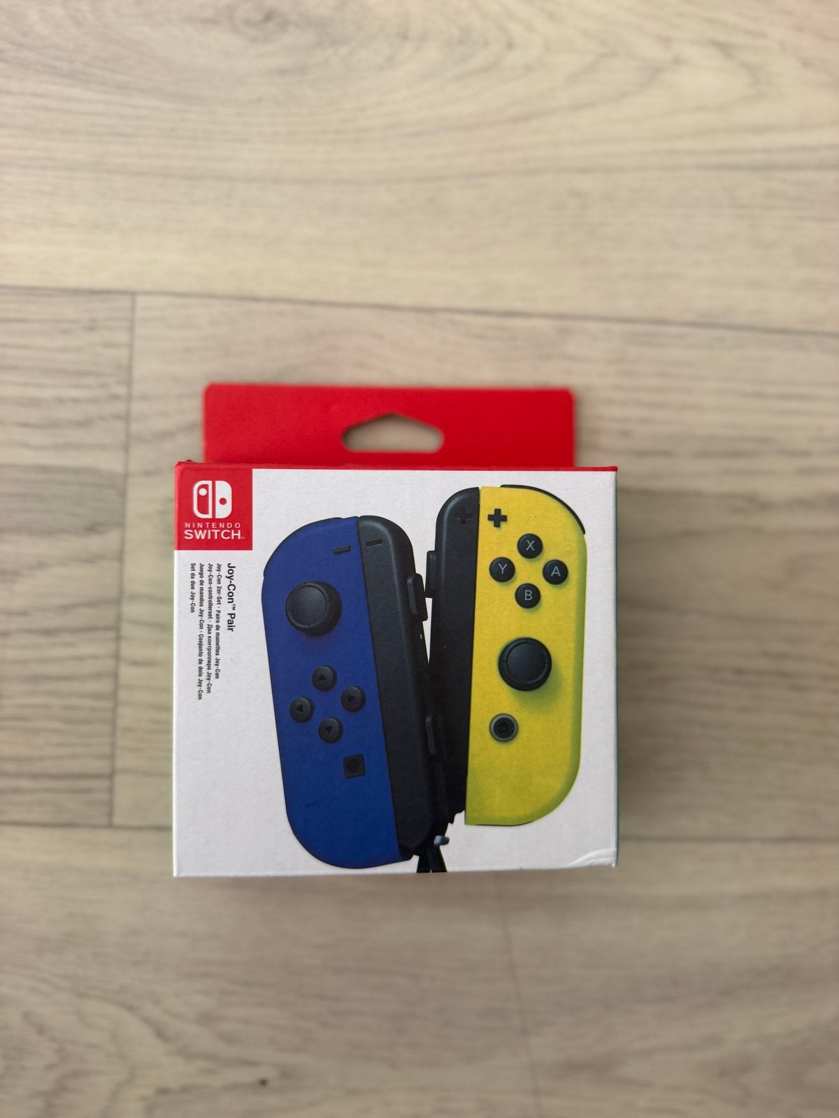 Nintendo Switch Joy-Con-paar - Blauw en Geel, Spelcomputers en Games, Ophalen of Verzenden, Nieuw, Met 2 controllers, Switch Original