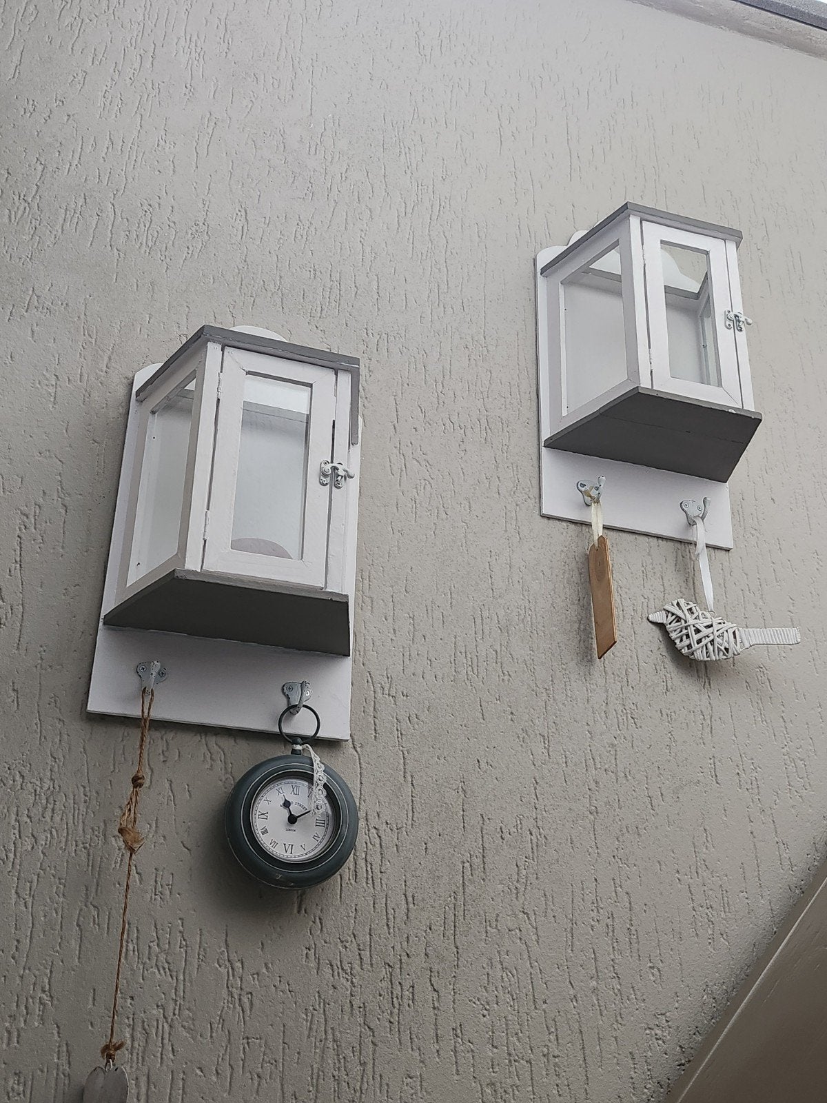 muur  //  windlichten, Ophalen
