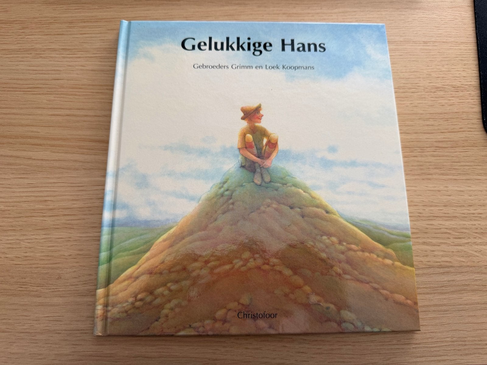 Gelukkige Hans - Gebroeders Grimm & Loek Koopmans, Boeken, Ophalen of Verzenden, Zo goed als nieuw, 3 tot 4 jaar
