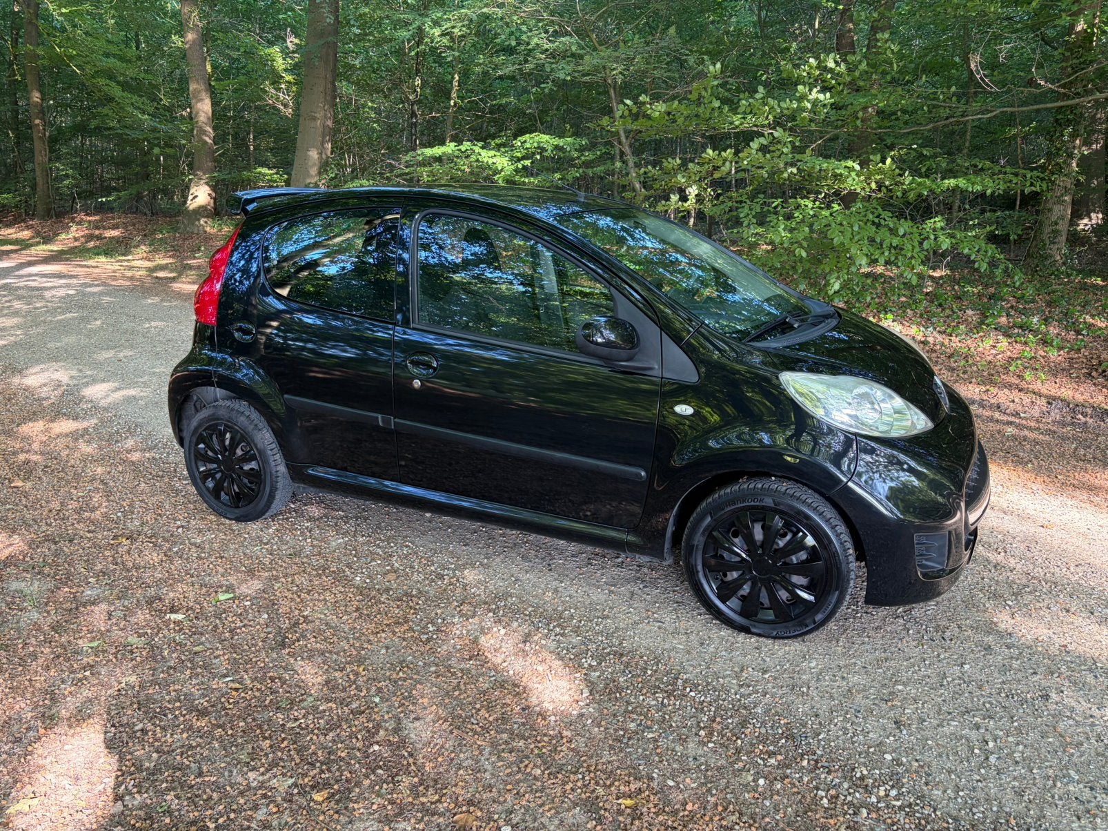 Peugeot 107 1.0 12V 5DR carplay spoiler airco, Voorwielaandrijving, Euro 5, Stof, Zwart