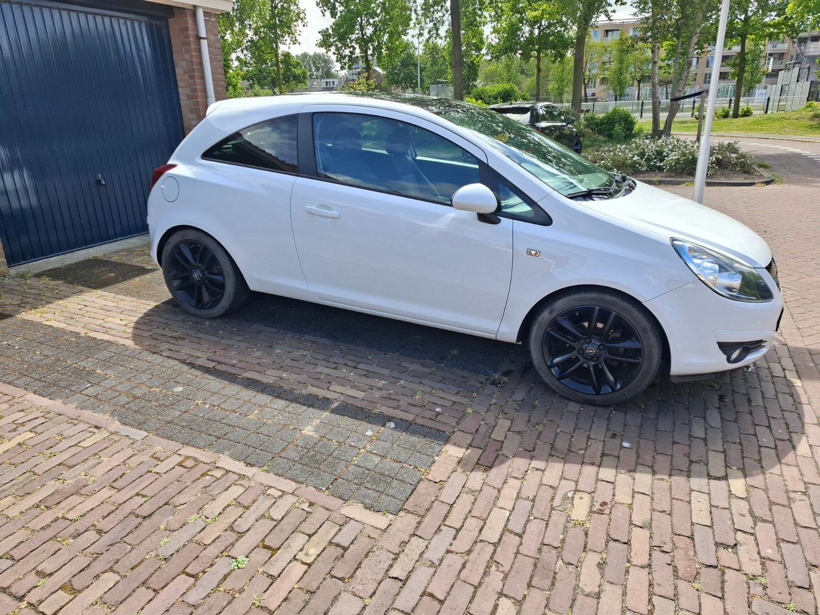 Opel Corsa 66kw (89pk) black & white edition, Auto's, Voorwielaandrijving, Zwart, 4 cilinders, Wit
