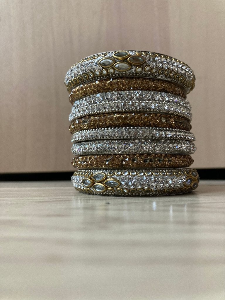 Indiase/ Pakistaanse/ Bollywood armbanden, Ophalen of Verzenden, Zo goed als nieuw, Goud, Kunststof of Plastic