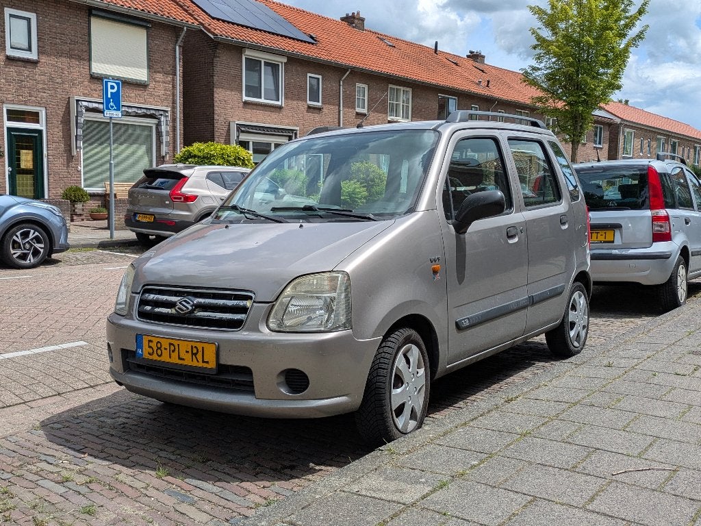 Suzuki Wagon R+ 1.3 2004 Grijs, Voorwielaandrijving, Stof, 40 €/maand, Origineel Nederlands