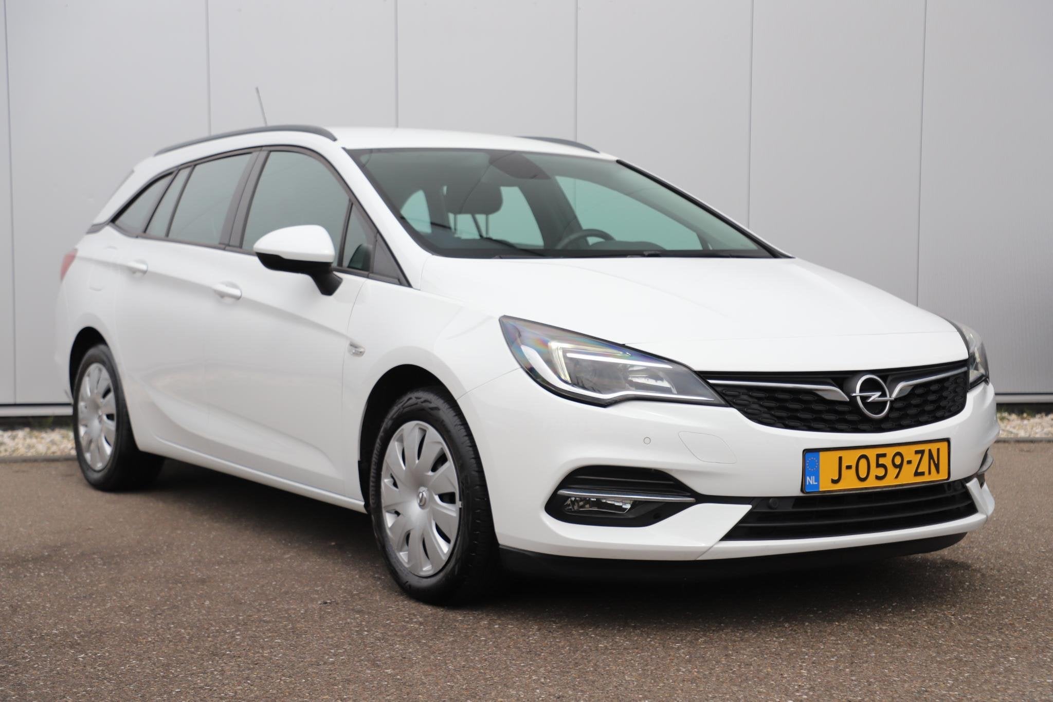 Opel Astra Sports Tourer 1.2 Business Executive 110PK Trekha, Auto's, Voorwielaandrijving, Stof, Gebruikt, 1199 cc
