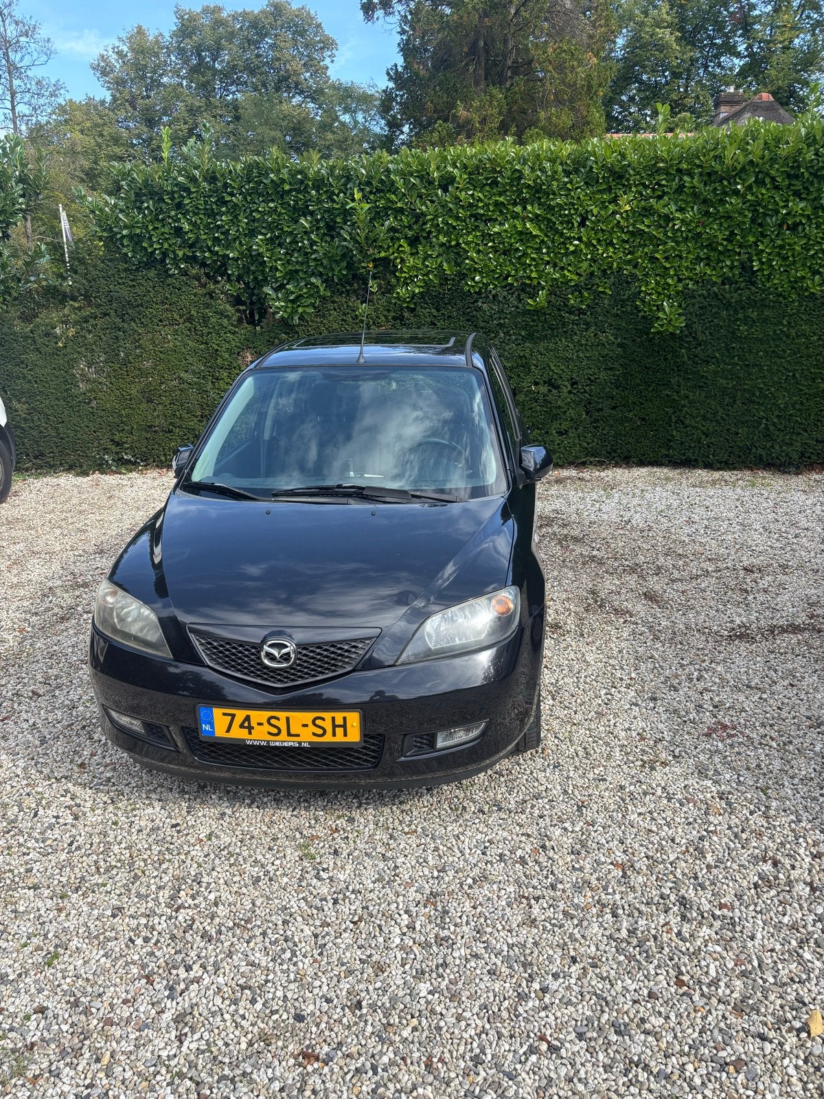 Mazda 2 1.4 16V 2006 Zwart, Auto's, Voorwielaandrijving, 15 km/l, 40 €/maand, 4 cilinders