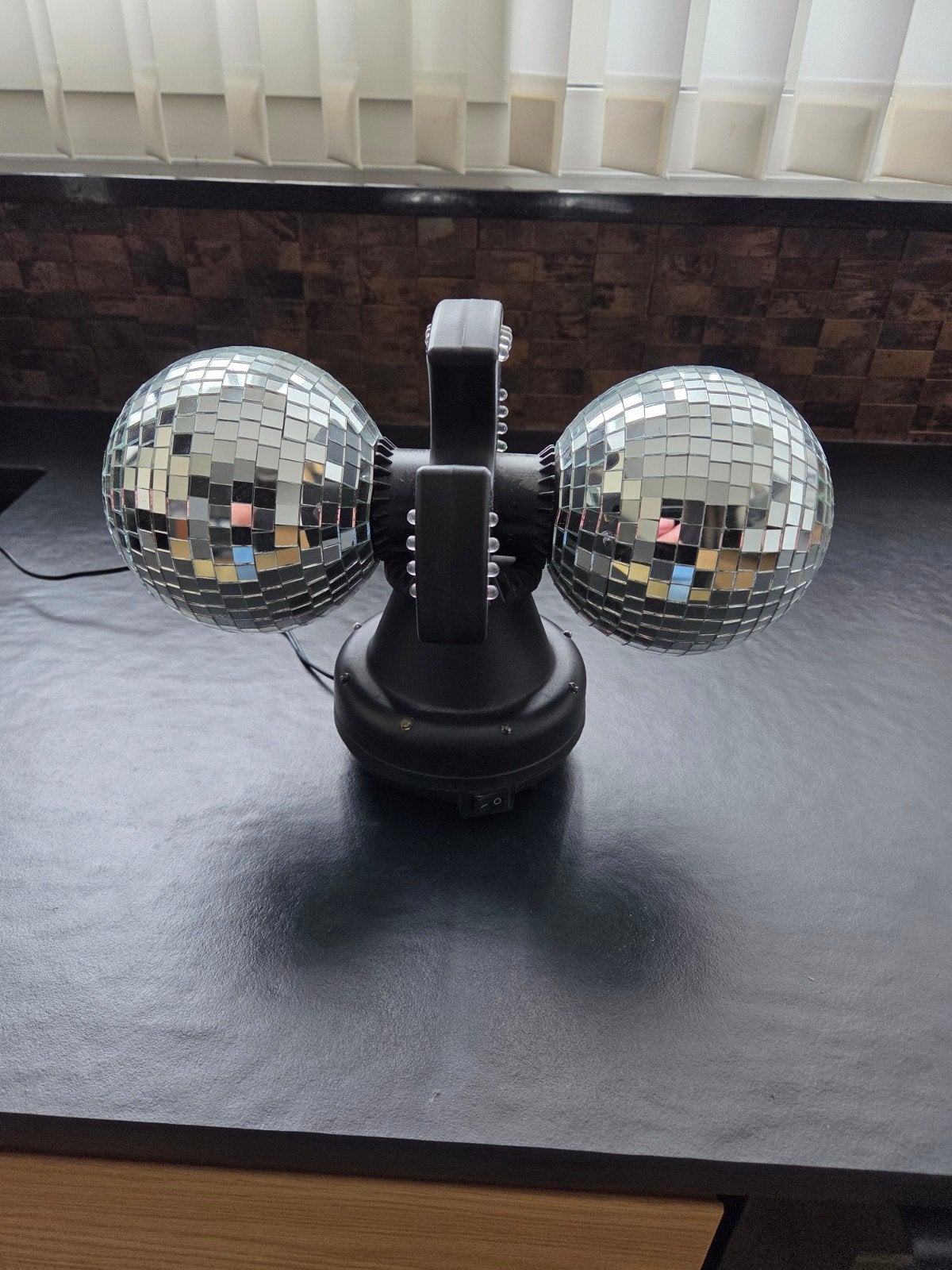 Dubbele discobal met verlichting, Ophalen