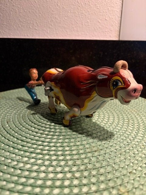 Vintage blikken windup stier met jongetje Mikuni Japan '50, Ophalen of Verzenden