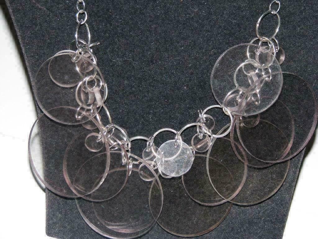 Nieuwe ketting van Manouk,grijze (kleurloos) ringen,schijven, Ophalen of Verzenden, Nieuw