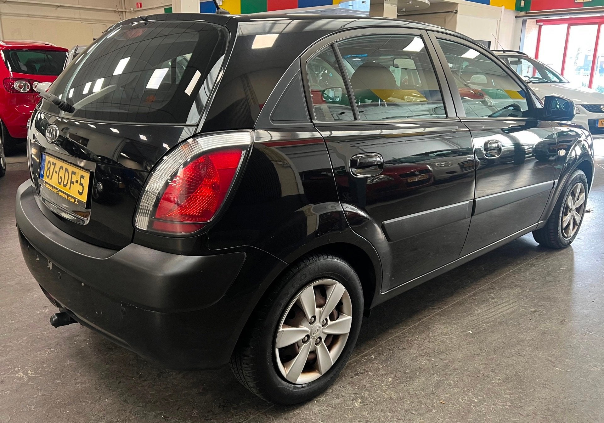Kia Rio 1.4 X-pect - Airco – NAP – Afneembare Trekhaak, Auto's, Voorwielaandrijving, Stof, Gebruikt, Zwart