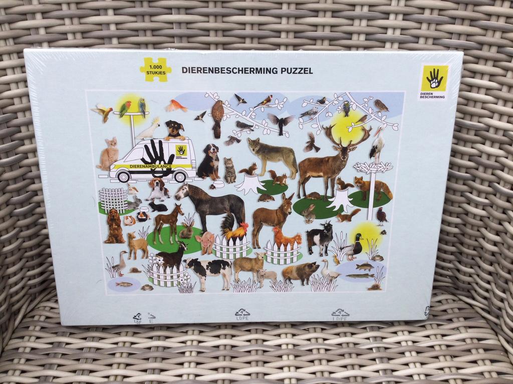 Puzzel dieren 1000 dierenbescherming Nieuw in folie, Ophalen of Verzenden, 500 t/m 1500 stukjes, Nieuw, Legpuzzel