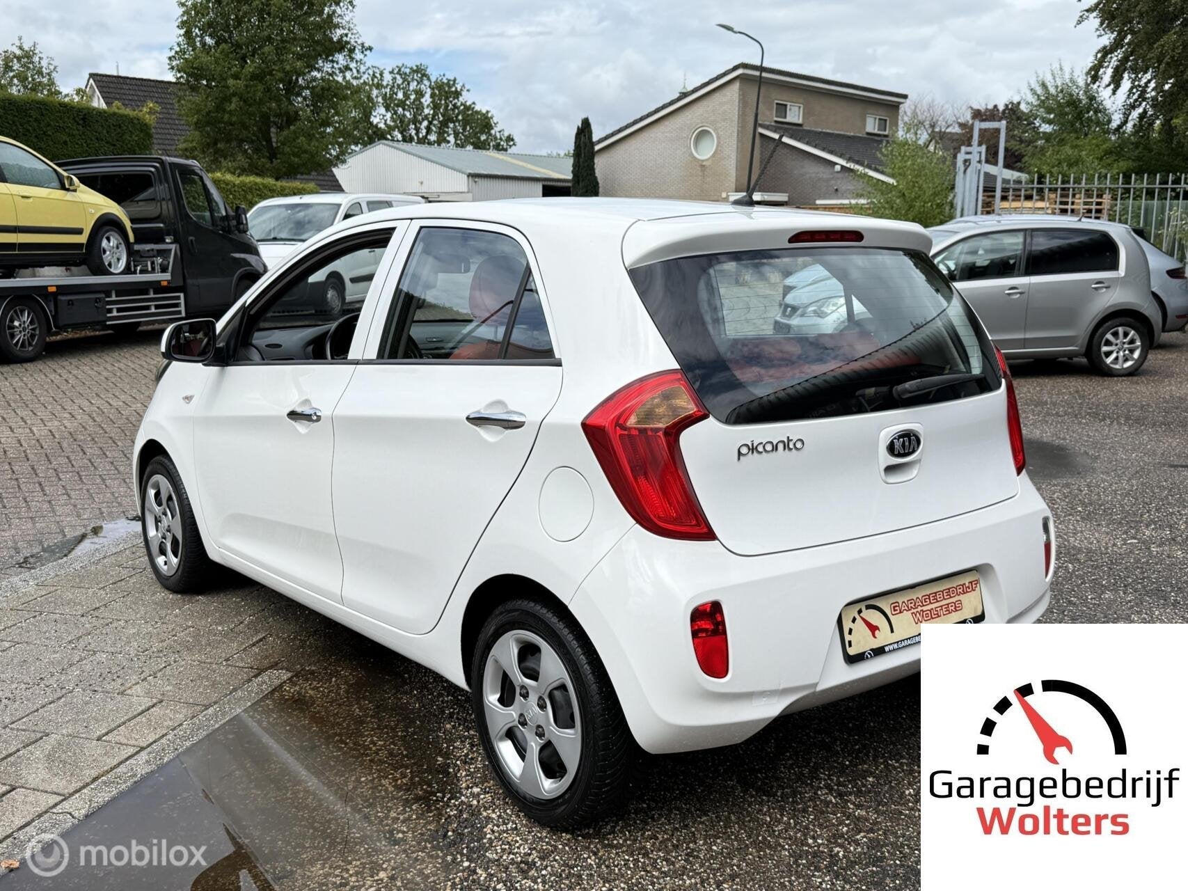 Kia Picanto 1.0 Design Edition rood leer stoel+stuurverw., Voorwielaandrijving, Gebruikt, Met garantie (alle), Wit