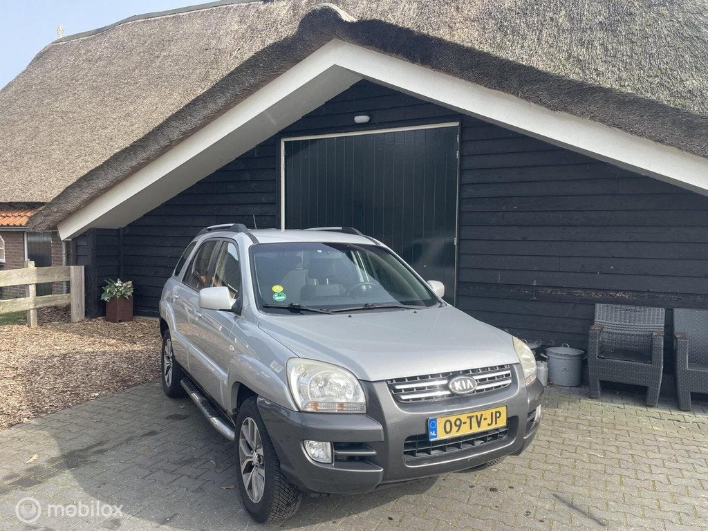 Kia Sportage 2.0 CVVT Comfort, Airco, Cruiscontrol, Auto's, Kia, 1442 kg, Stof, Gebruikt, Zwart
