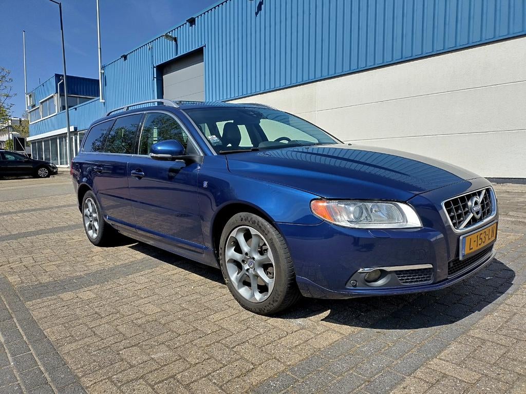 Volvo V70 T5 177KW Aut. 2012 Blauw, Auto's, 1800 kg, Zwart, 4 cilinders, Blauw