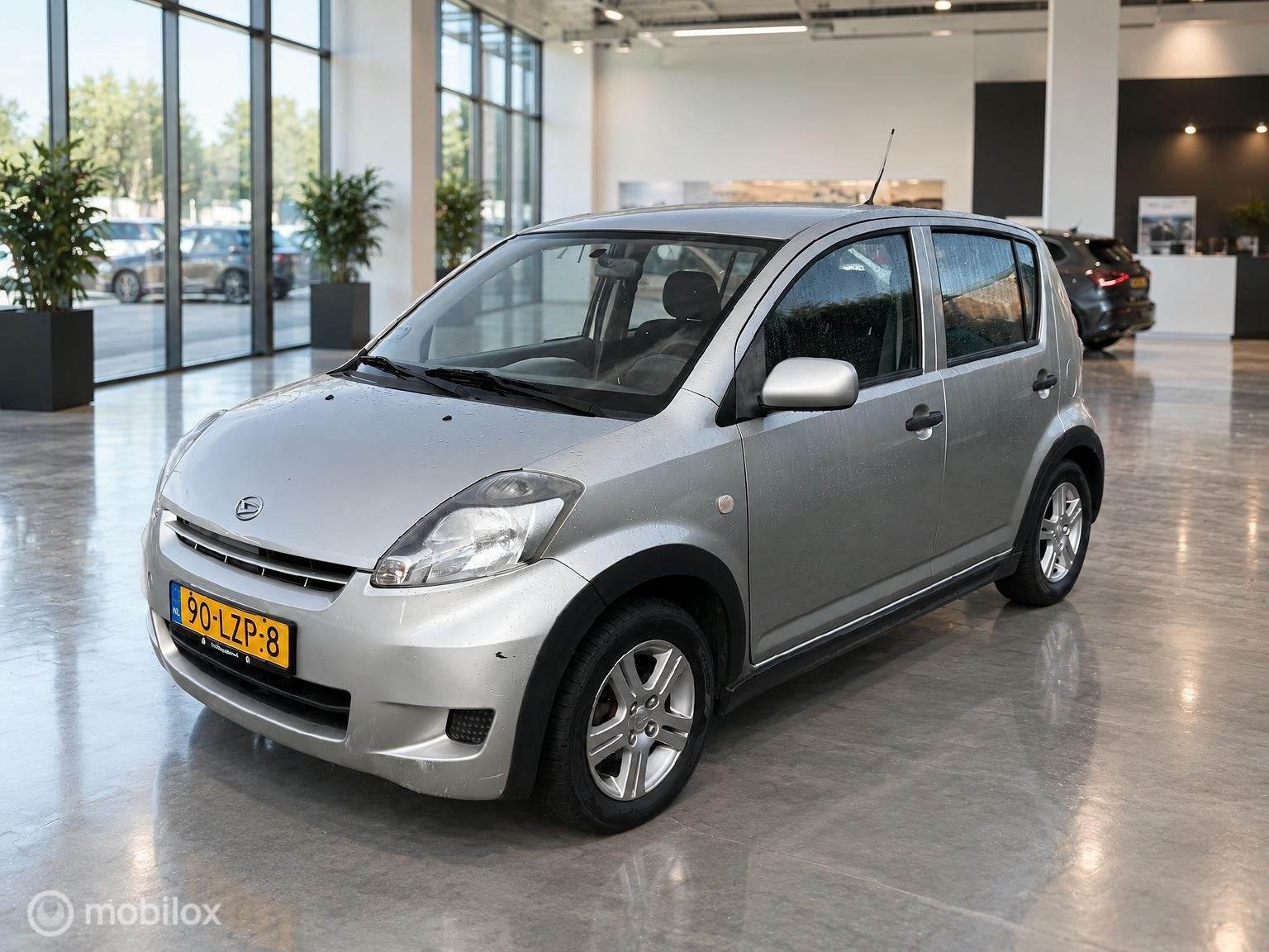 Daihatsu Sirion 2 1.0-12V Premium, Auto's, Voorwielaandrijving, Gebruikt, Beige, Bedrijf