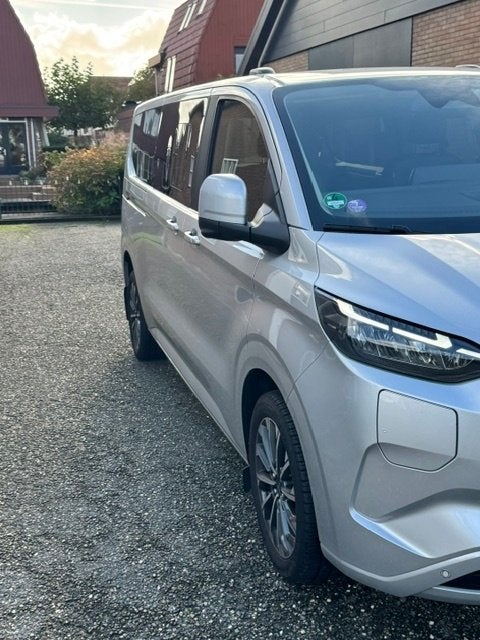 Ford Tourneo Custom Titaniun X   L2H1  8 persoons - BTW auto, Auto's, Dealer onderhouden, 1850 kg, Leder en Stof, Plug-in hybride