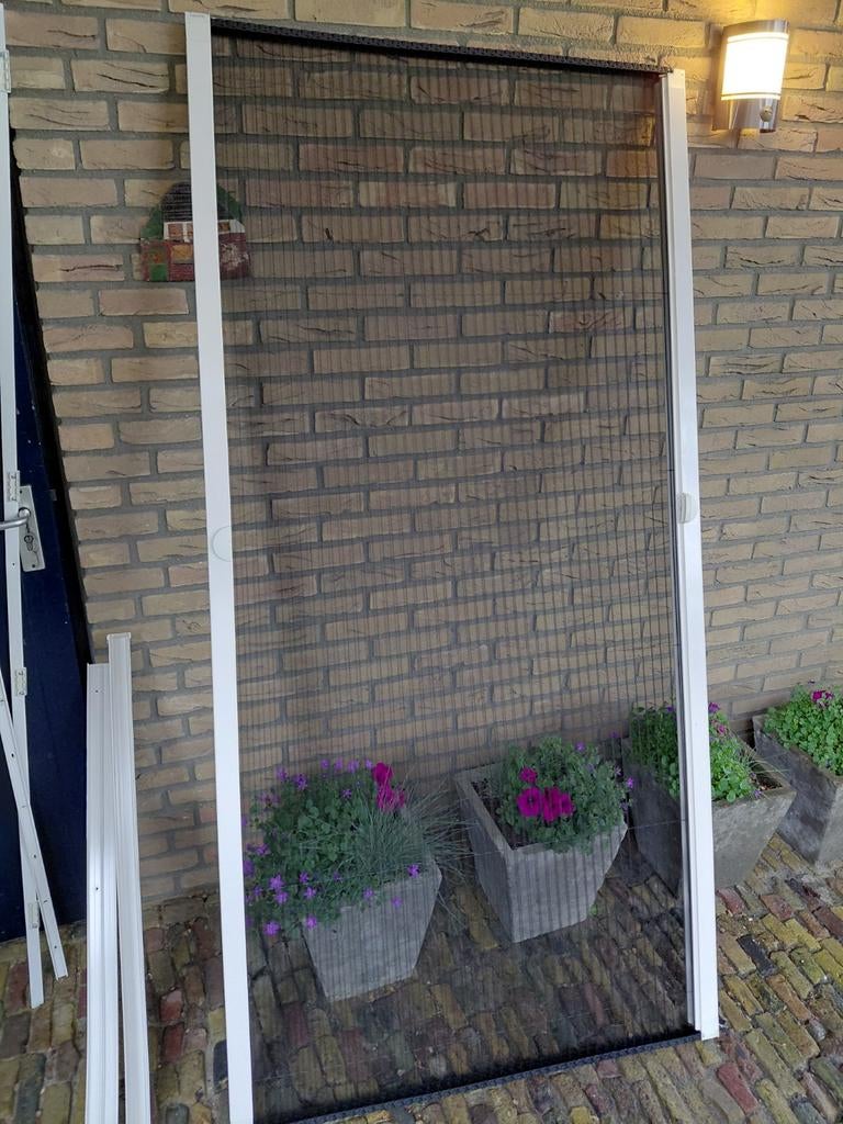 2 jaar jong is de UNILUX PLISSE ROL HORDEUR  KLEUR WIT IS, Doe-het-zelf en Verbouw, Deuren en Horren, Ophalen of Verzenden, Zo goed als nieuw