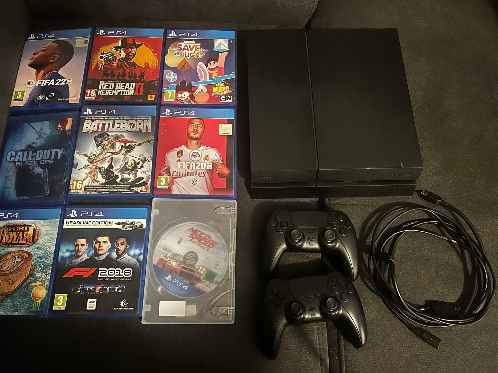 PlayStation 4 (PS4) met 2 Battletron controllers en 9 games, Met 2 controllers, Ophalen of Verzenden, Original, 500 GB