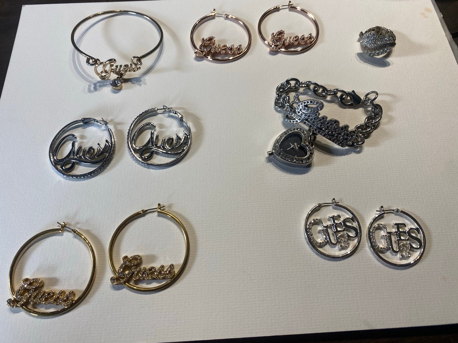 GUESS items hele set €25,-, Overige materialen, Ophalen of Verzenden, Goud, Met strass