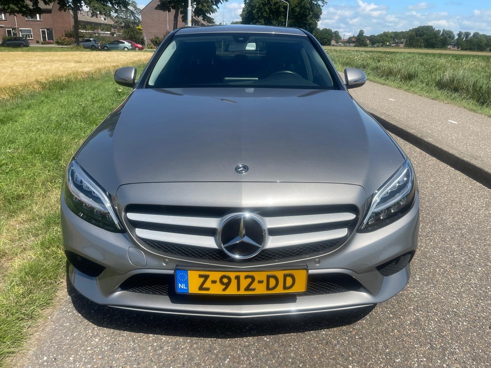Mercedes-Benz C-Klasse C180 156pk 2021 Grijs    0627154365, Auto's, Mercedes-Benz, Achterwielaandrijving, 1340 kg, 75 €/maand