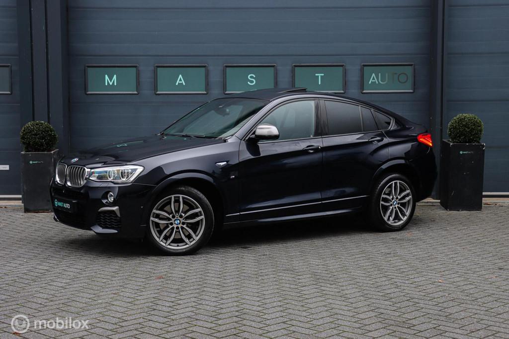 BMW X4 M40i High Executive|HUD|H&K|Schuifdak|Leder|Camera, Auto's, BMW, Automaat, Gebruikt, Zwart, Leder