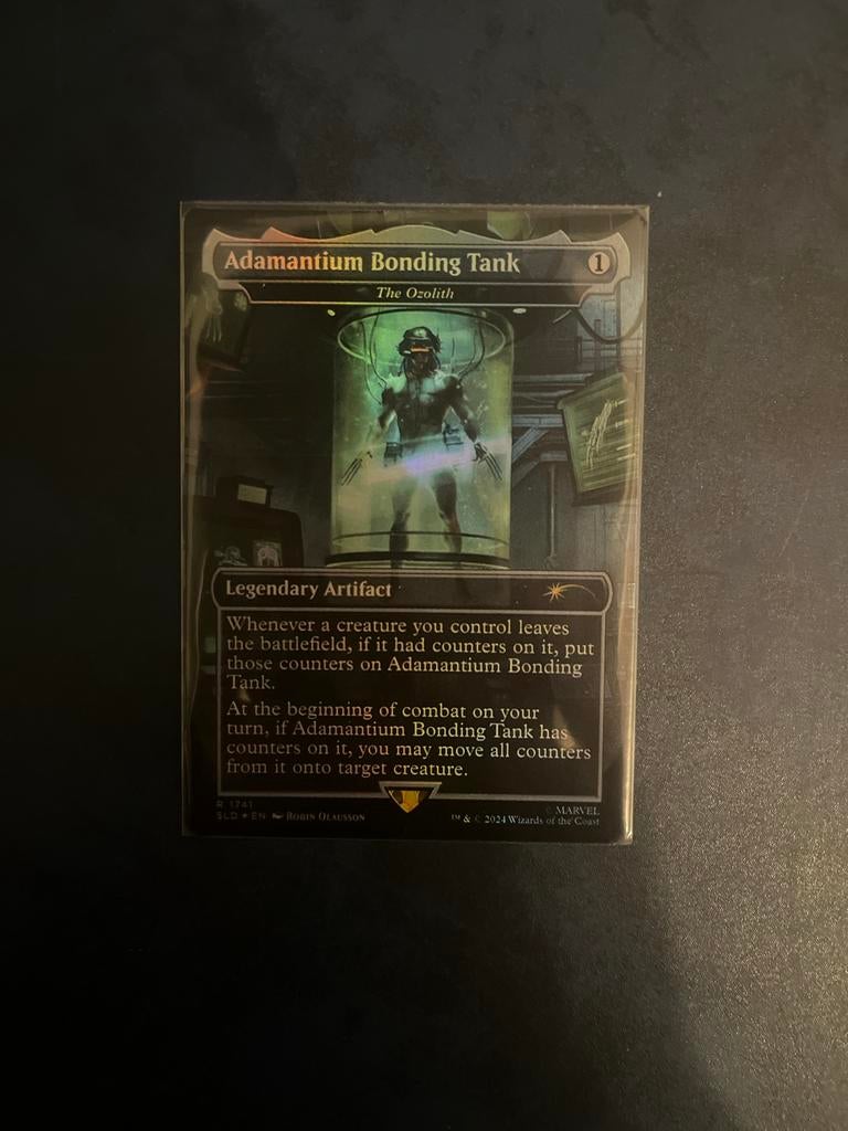 MTG Marvel Secret Lair Adamantium Bonding Tank Foil NM, Ophalen of Verzenden, Zo goed als nieuw, Losse kaart, Foil