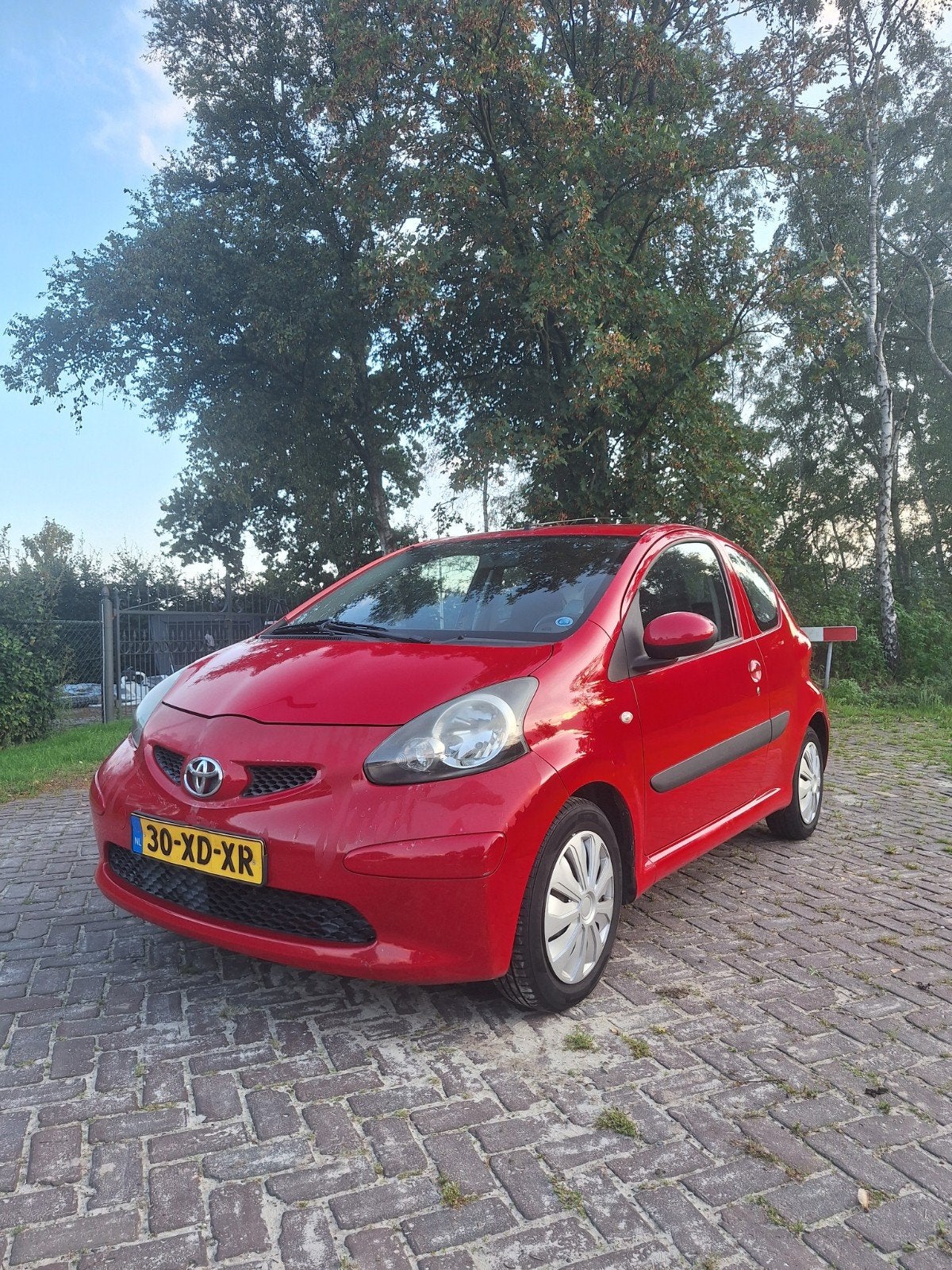 Toyota Aygo 1.0 12V Vvt-i 3DRS MMT 2007 Rood, Voorwielaandrijving, Stof, Zwart, 4 stoelen
