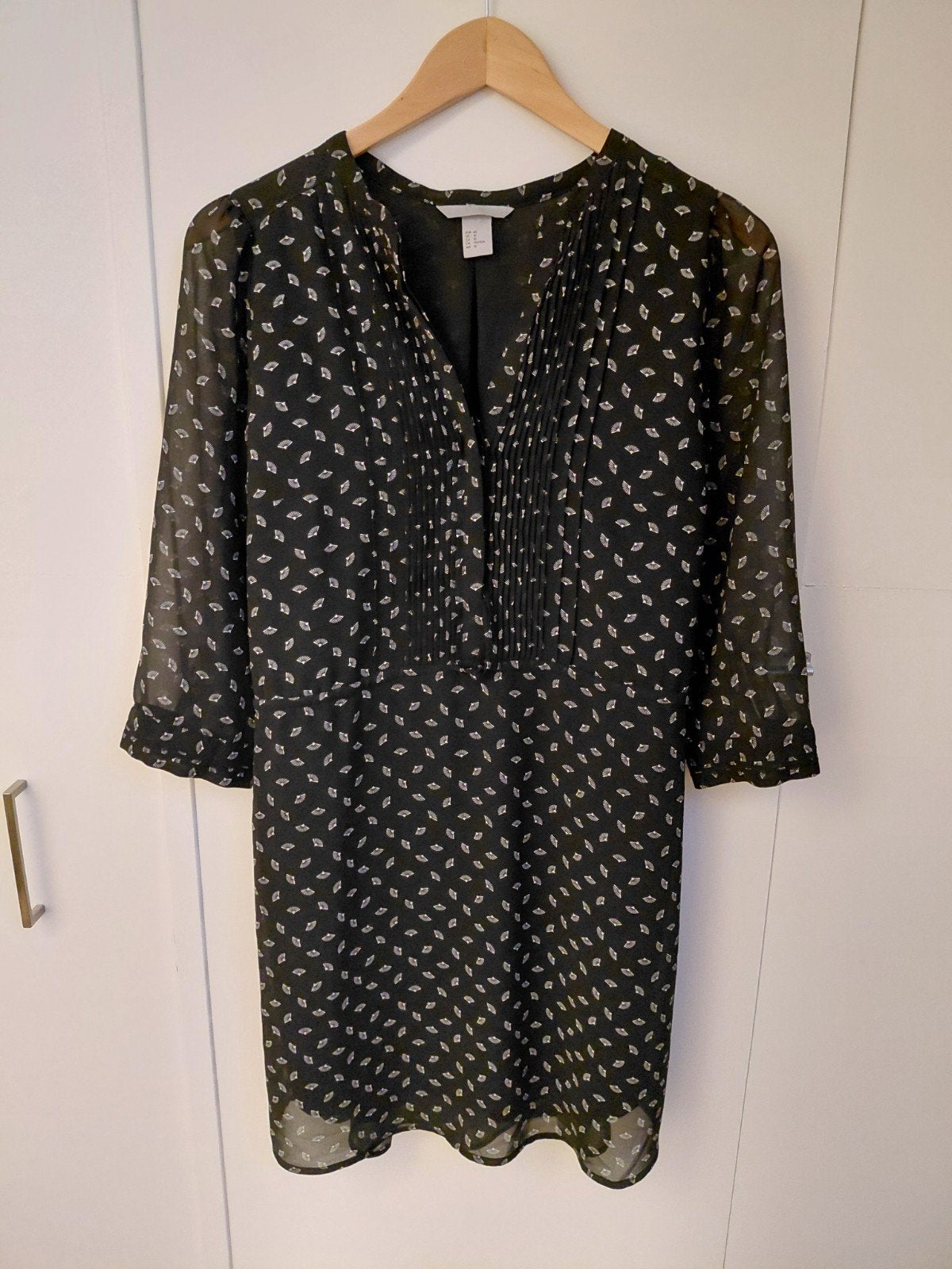 Tuniek zwart met klein wit printje van H&M maat 40, Maat 38/40 (M), H&M, Zwart, Ophalen of Verzenden