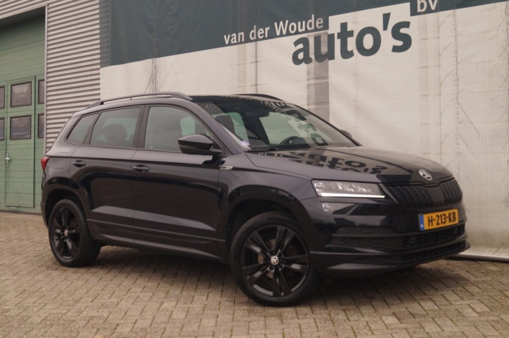 Skoda Karoq 1.5 TSI 150pk Sportline Business -PANO-ECC-LED-N, Auto's, Skoda, Voorwielaandrijving, Stof, Euro 6, 4 cilinders