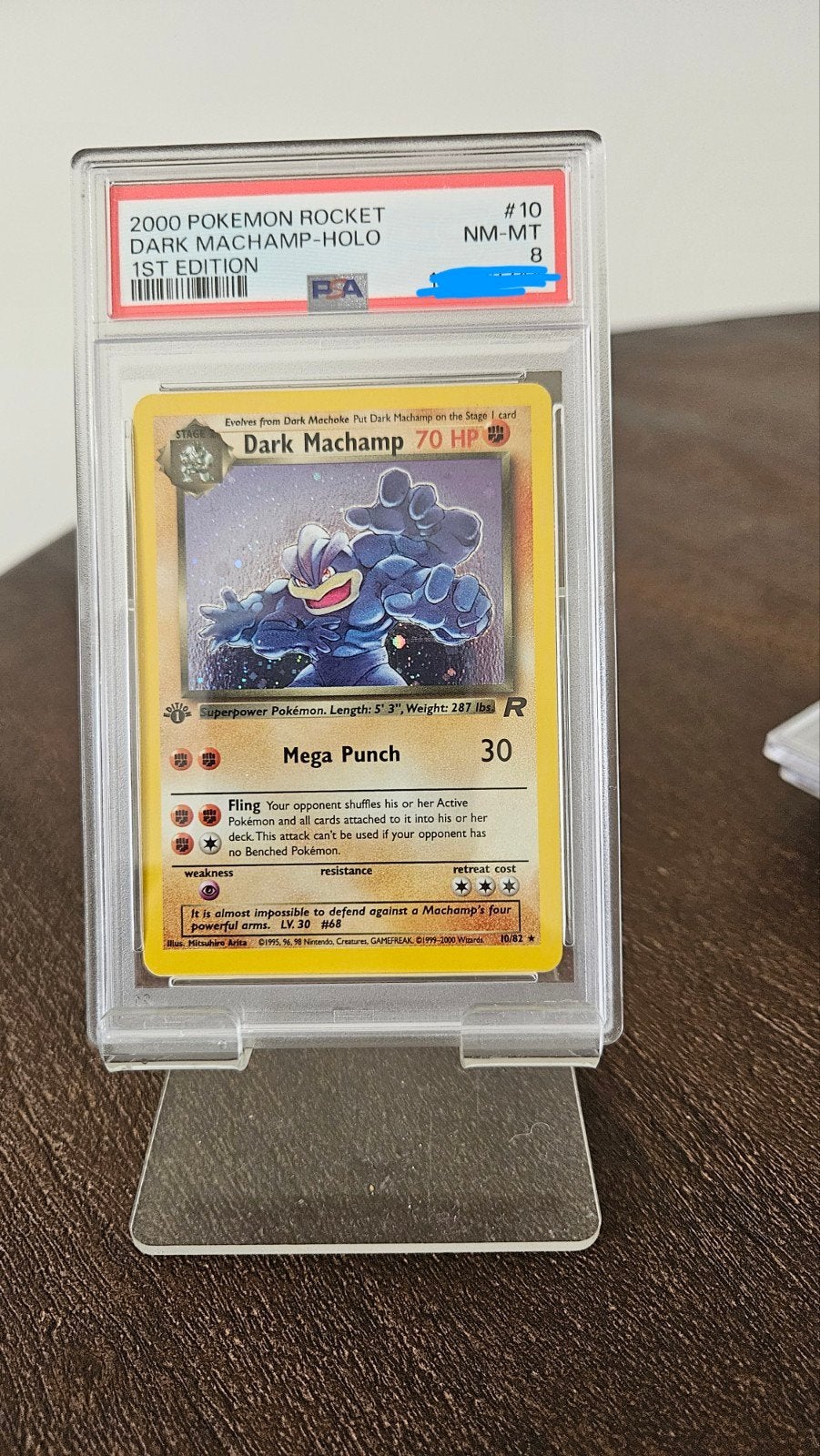 PSA 8 Dark Machamp Holo 1st Edition Pokémon Rocket, Ophalen of Verzenden