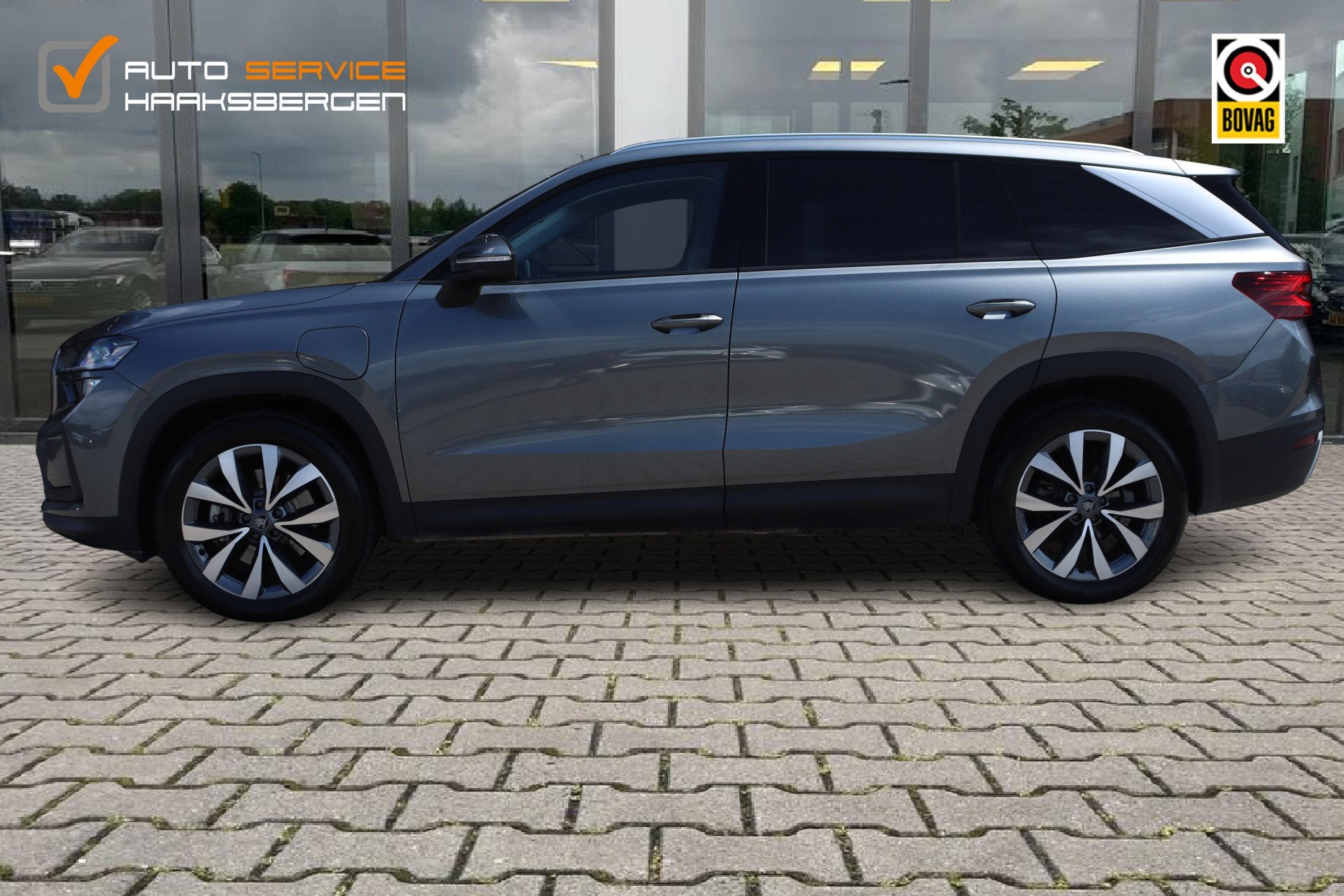 Skoda Kodiaq 1.5 TSI PHEV 204 PK Business Edition | Pano | T, Auto's, Skoda, Stof, Zwart, 4 cilinders, 26 kWh