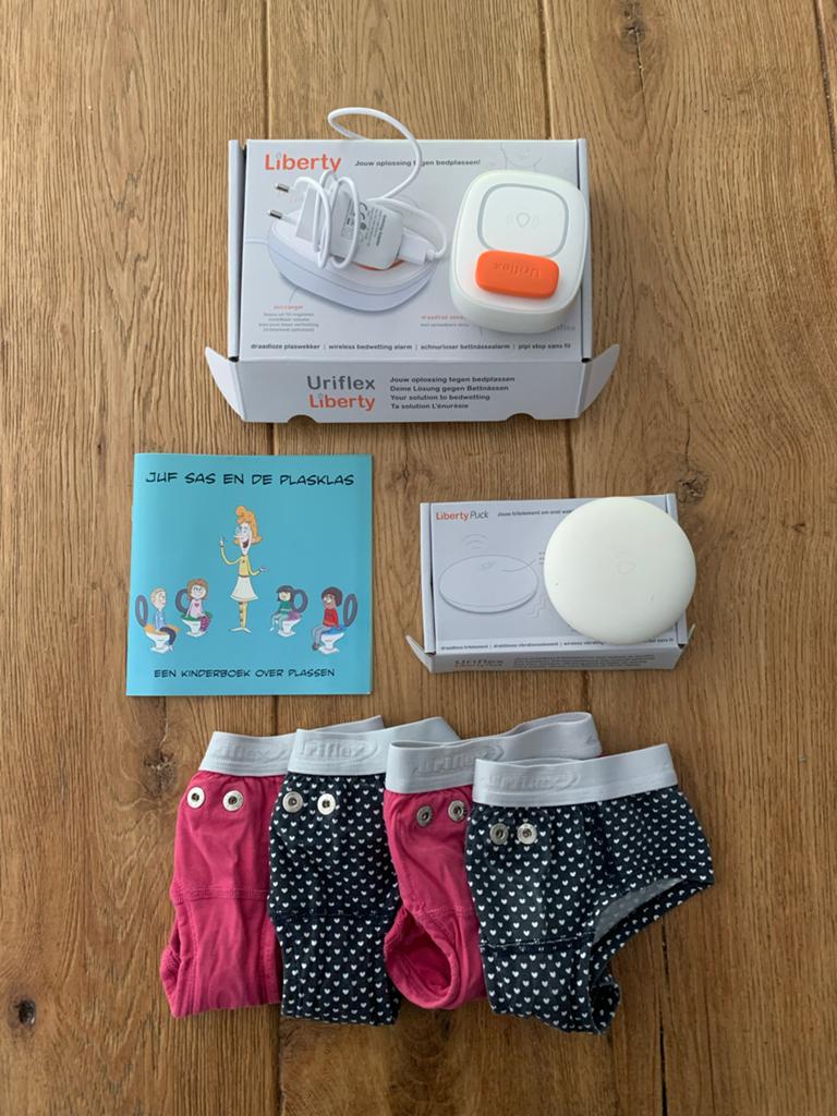 Uriflex Liberty plaswekker + 4 onderbroekjes en trilelement, Kinderen en Baby's, Kinderspulletjes, Ophalen of Verzenden, Gebruikt
