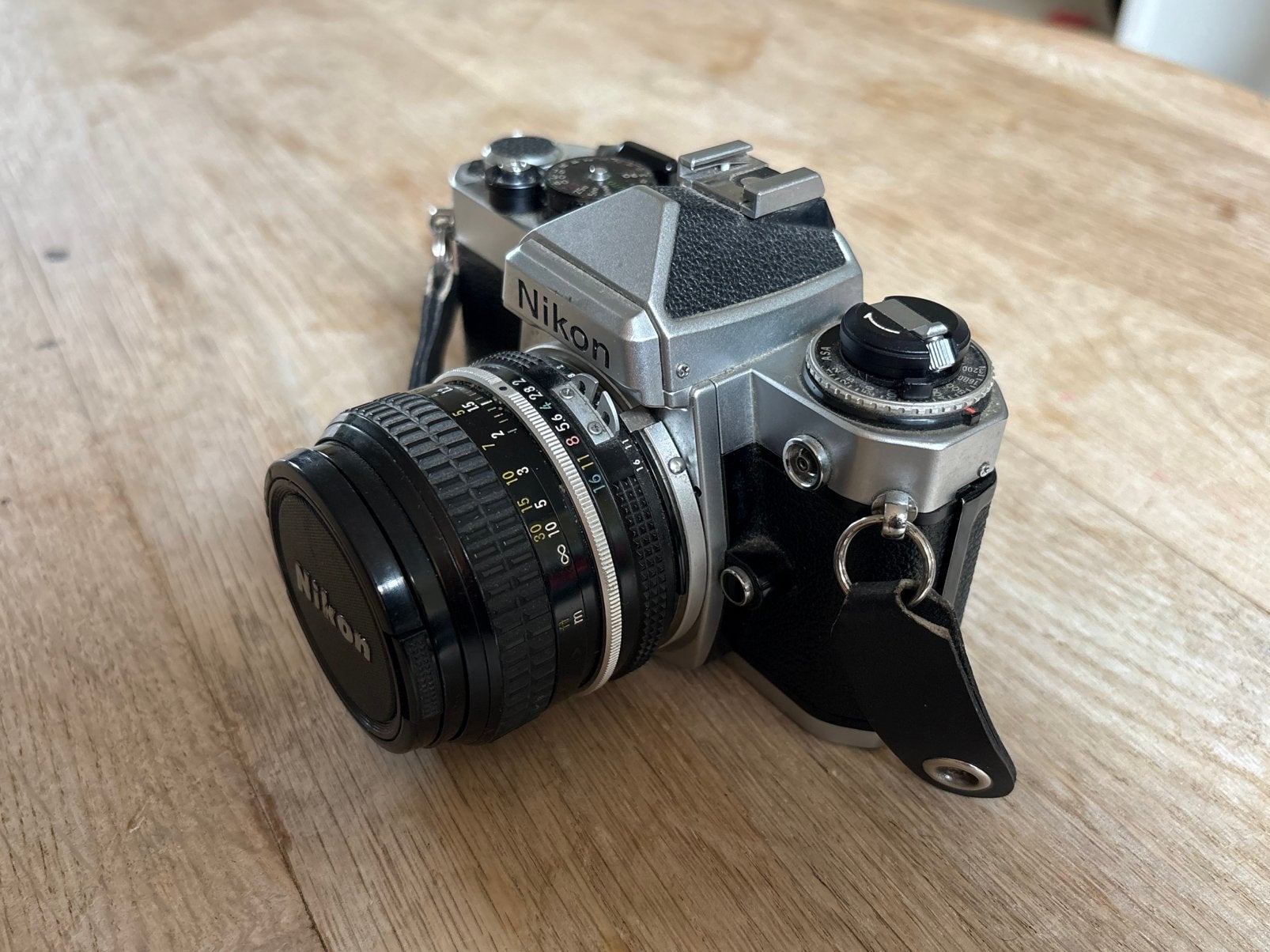 Nikon FE camera met Nikkor 50/2 lens, Audio, Tv en Foto, Fotocamera's Analoog, Ophalen of Verzenden, Gebruikt, Spiegelreflex, Nikon