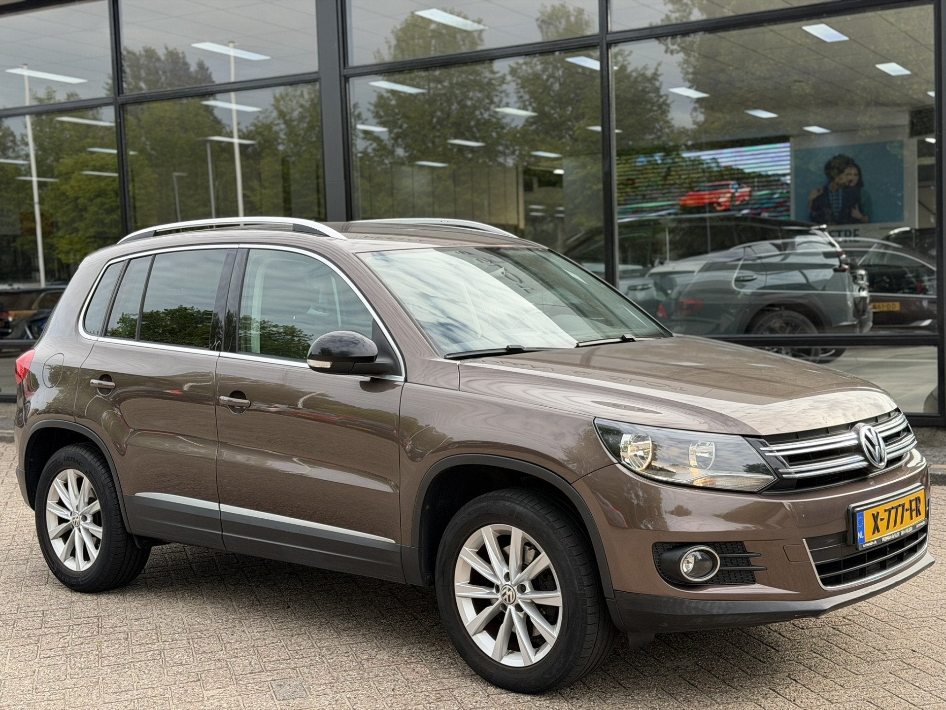 Volkswagen Tiguan 1.4 TSI Comfort&Design (bj 2013), Voorwielaandrijving, Gebruikt, Zwart, 4 cilinders