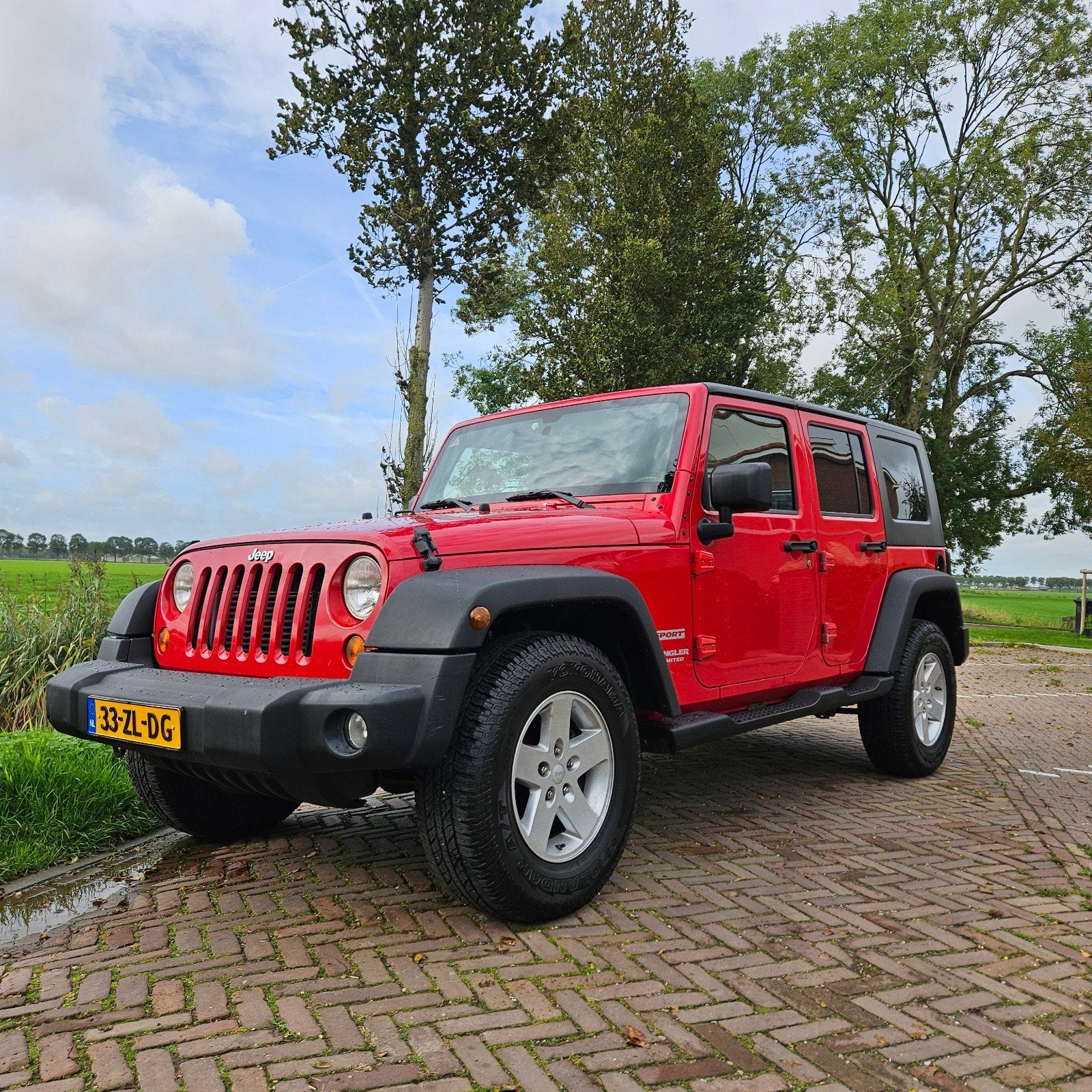 Jeep Wrangler 2.8 CRD Unlimited AUT 2008 Rood, Auto's, Automaat, Stof, 4 cilinders, 241 €/maand