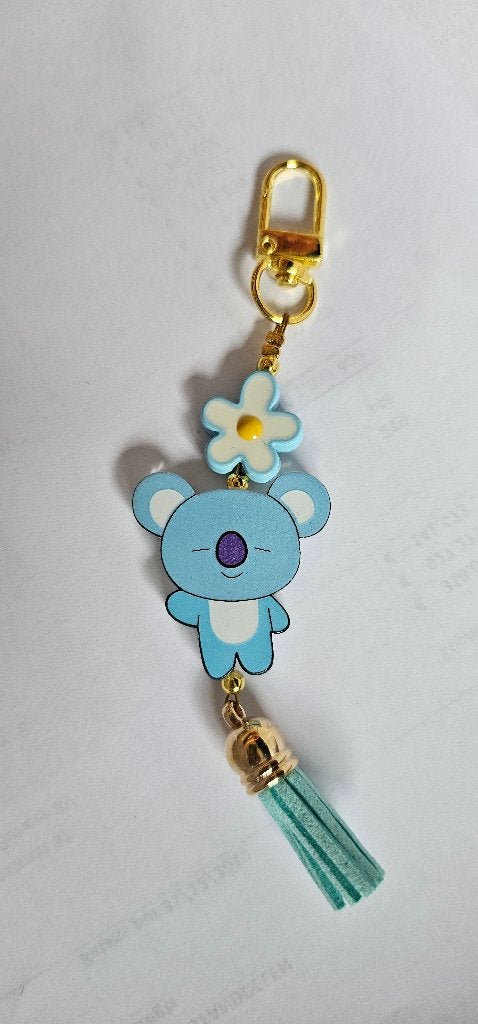 BT21 Koya sleutelhanger met bloem en kwastje, Ophalen of Verzenden, Nieuw, Knuffel of Figuurtje
