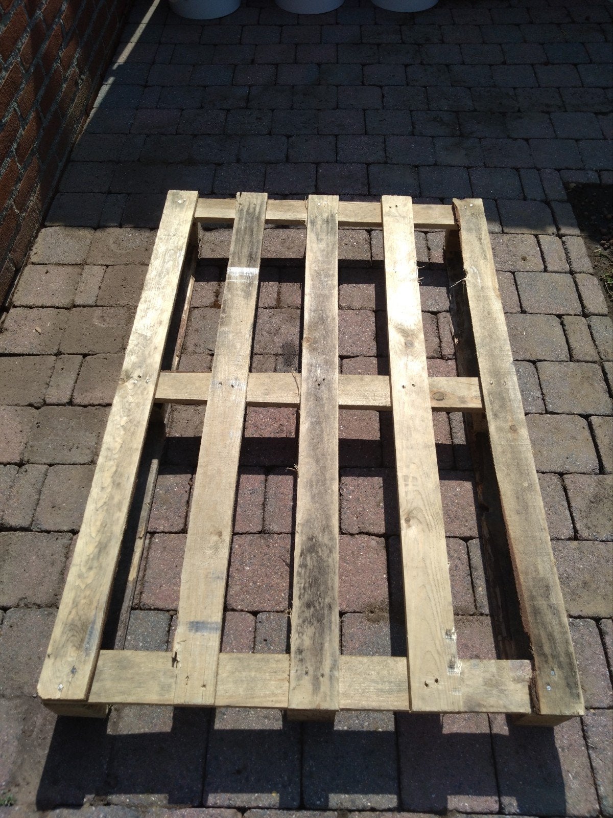 Houten eenmalige pallet, Ophalen