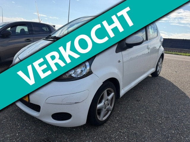 Toyota Aygo 1.0-12V Comfort Navigator Airco Navigatie APK 08, Auto's, Voorwielaandrijving, Euro 5, Stof, Gebruikt