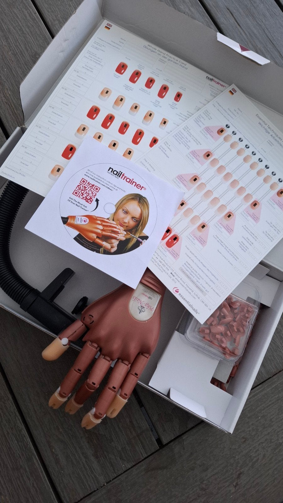 Nageltrainer oefenhand, Ophalen
