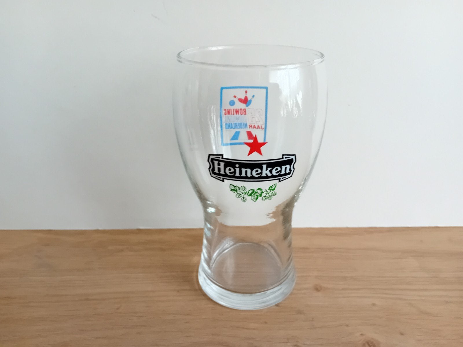 Heineken glas met achteropdruk, Ophalen of Verzenden, Zo goed als nieuw, Glas of Glazen, Heineken