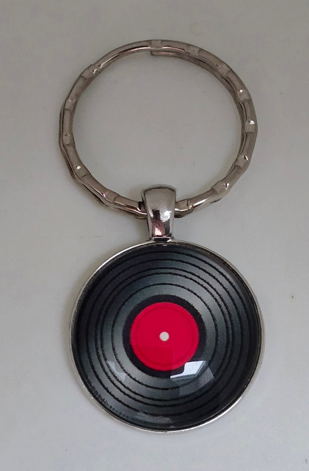 Sleutelhanger met vinylplaat design, Verzamelen, Ophalen of Verzenden, Nieuw, Overige typen