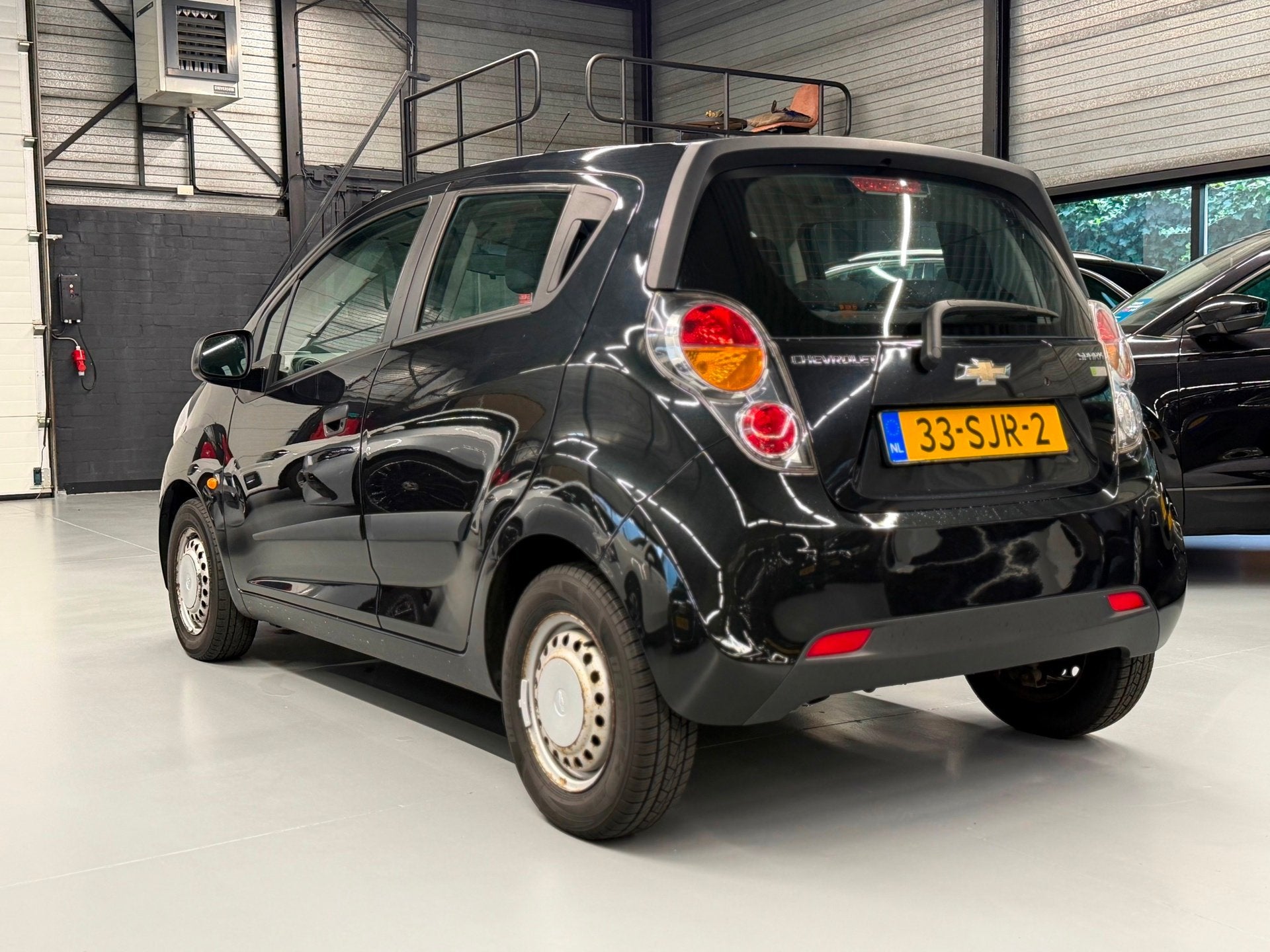 Chevrolet Spark 1.0 16V LS Bi-Fuel Navi l Cruise l Airco, Auto's, Stof, Zwart, Zwart, Origineel Nederlands