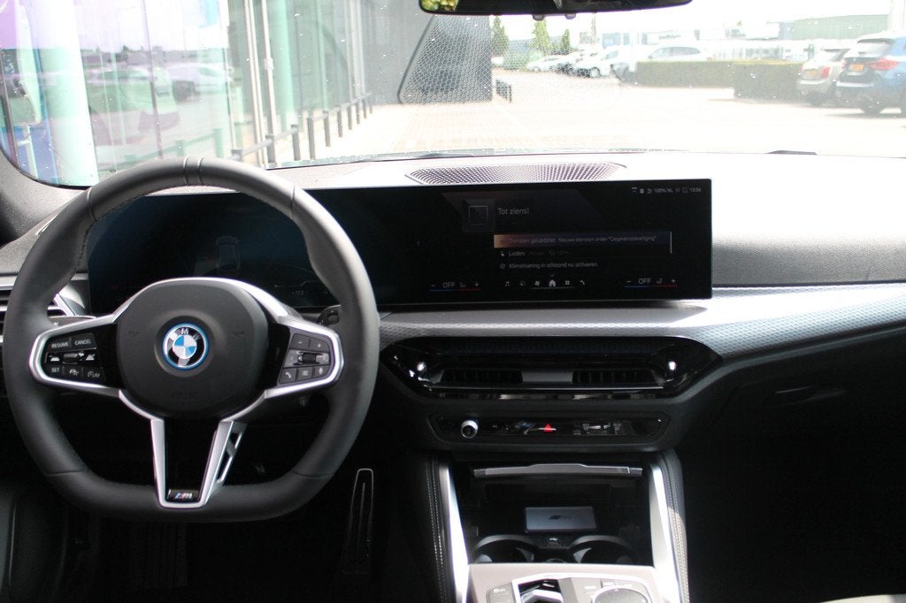 BMW i4 eDrive35 Gran Coupé M Sport / Achteruitrijcamera / A, Achterwielaandrijving, Gebruikt, Zwart, Met garantie (alle)