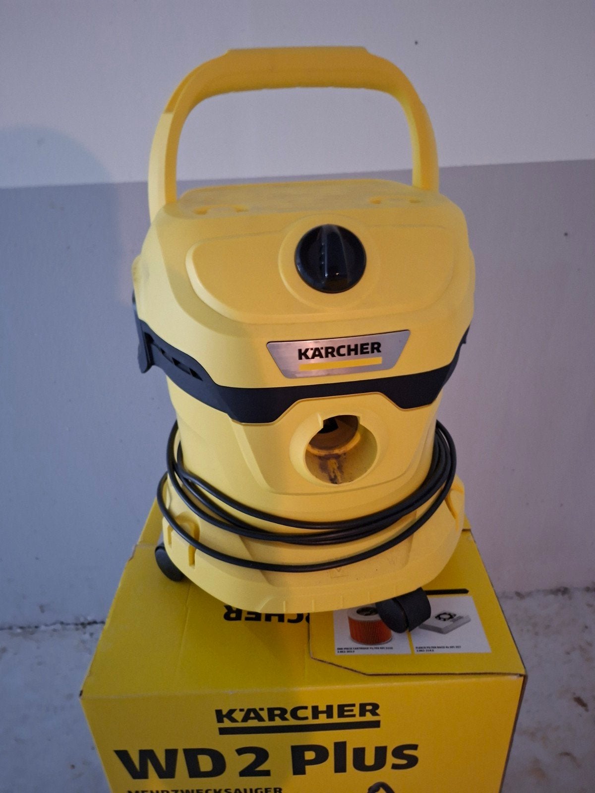 Stofzuiger van karcher, Ophalen